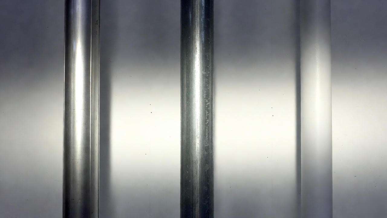 Comparison of extruded aluminum, galvanized steel, and fiberglass composite poles for outdoor post light fixtures