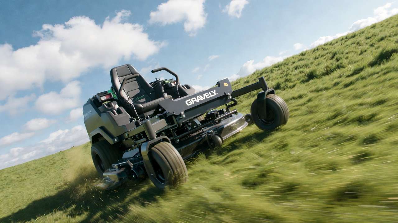 Gravely zero-turn mower demonstrating true zero-turn radius on hillside