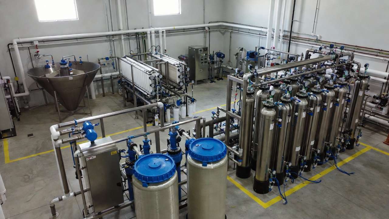 Full-scale car cleaning water reclamation and zero-waste treatment system in mechanical room