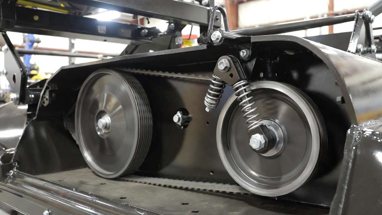 Gravely mower Constant Belt Tension CBT self-tensioning system close-up on deck