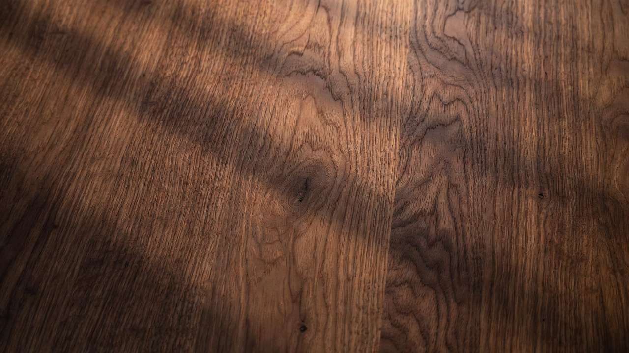 Close-up of black walnut grain texture demonstrating material properties for kitchen cabinets